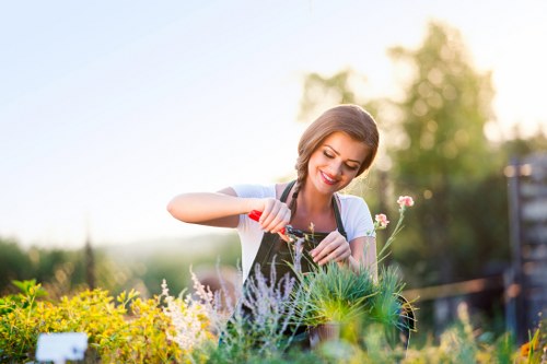 Gardener working on a front garden in Eltham